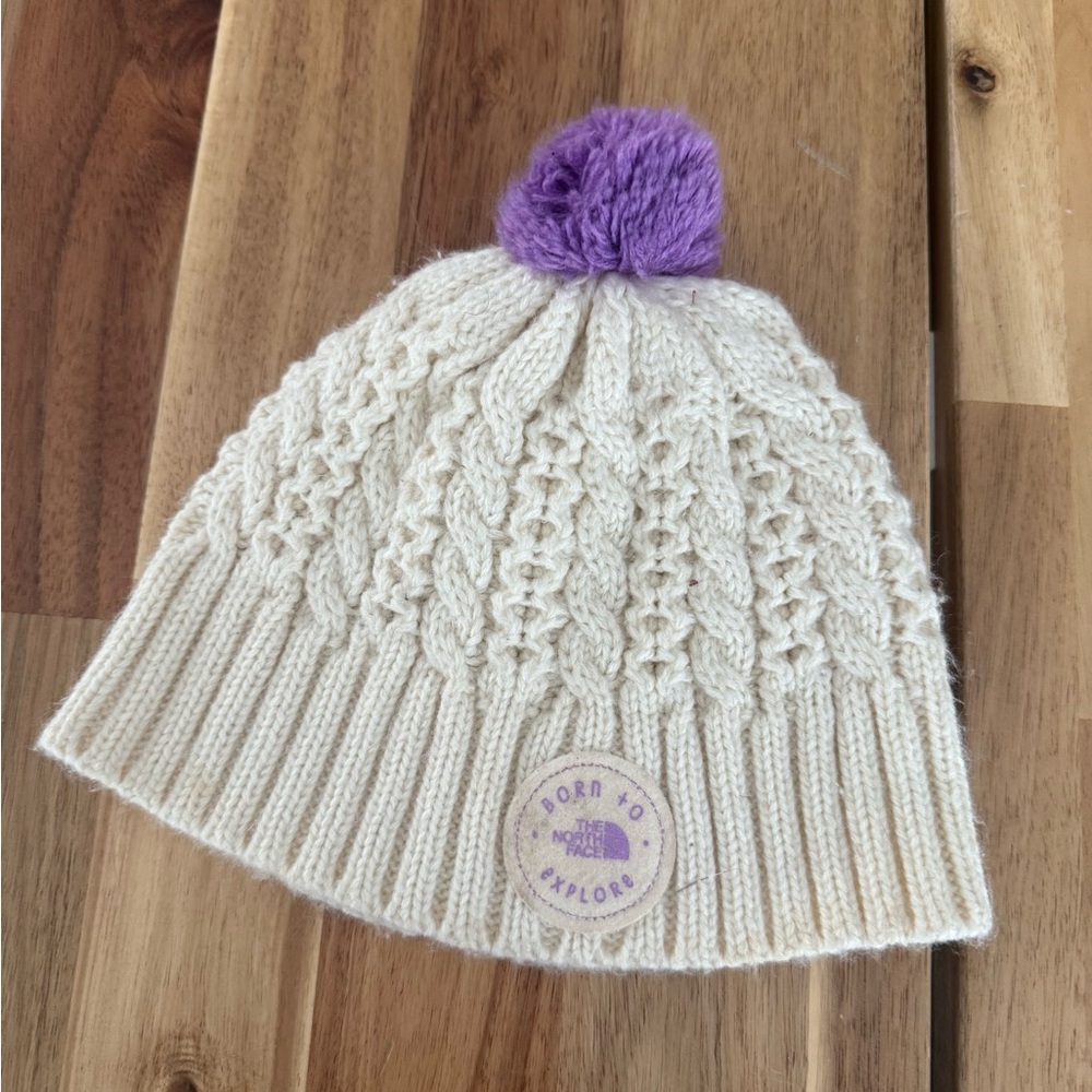 The North Face Cream Knit Beanie with Purple‎ Pom
